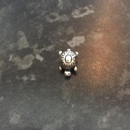 Genuine tortoise pandora charm in very good condition marked 925 ALE
