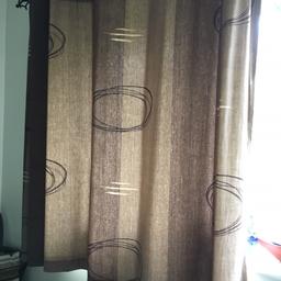 Pair of patterned eyelet curtains excellent condition.

Length: 135cm
Drop from top of eyelet: 132cm
Width: 228cm