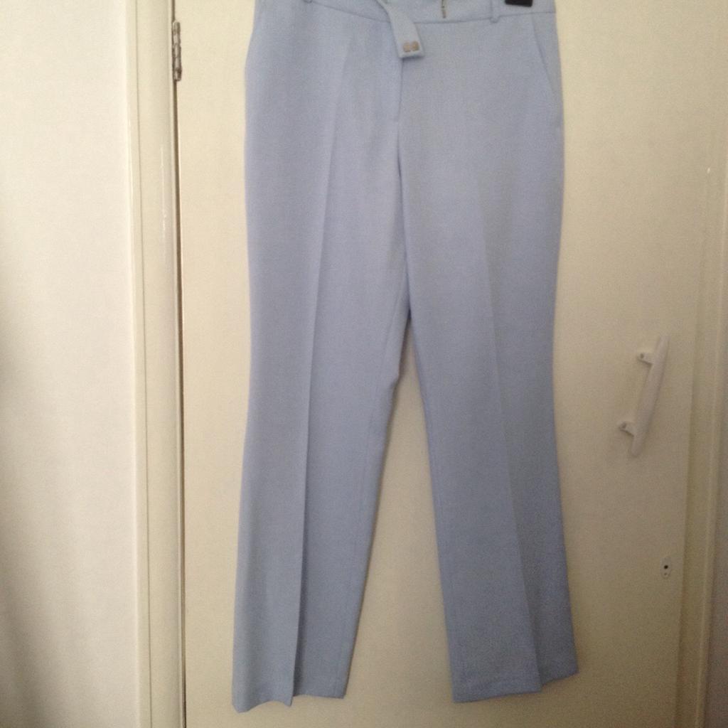 Light blue trousers. Lovely condition. BL4 Farnworth. Please do not make offer with delivery. If you require postage please ask via the question option. Thanks very much