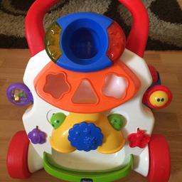 Chicco baby walker, comes with balls & shapes. Lights up and plays music. Excellent condition, used a handful of times. Has brakes on to stop the wheels from moving too.