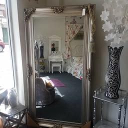 Large free standing mirror with baroque styling in silver.
Measurements are..
Hight 175cm
Width 95cm
Delivery available

Viewing available at
 Dated2Rated Interiors
50-56 North Bridge Street
 Sunderland
SR5 1AH