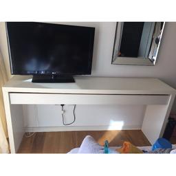Ikea white malm long dressing table and draw.  In used condition but still looks good,  from a smoke and animal free home. Please check photos.
W x 191 cm H x 91 cm D x 43 cm
They don't make these anymore so grab yourself s Ikea design classic