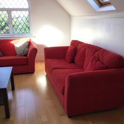 Red sofa and large armchair 
Sat on a few times only 
Collection only