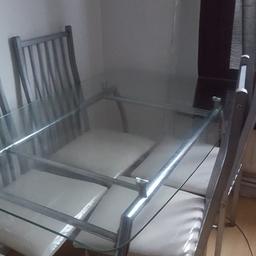 Very strong steel table with glass top with 6 steel chairs glass has age related scratches
But very strong set