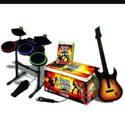 Gutar, microphone, gutar hero world tour game, and drums and sticks ps3.