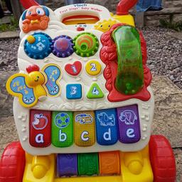 Used baby walker in great condition with phone. Sticker has lifted on on the one butterfly wing but nothing major. All great condition