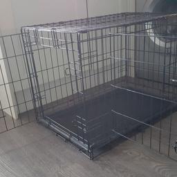 Dog cage suitable for smallish dog. Length 75cm width 48cm depth 52cm. Folds away for easy storage. Good condition.