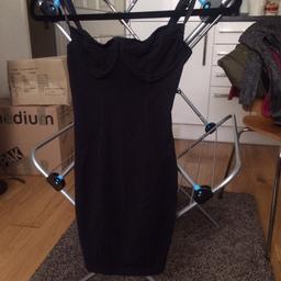 Price negotiable. Black american apparel bodicon size S dress. Never worn- as if new. Collection only
