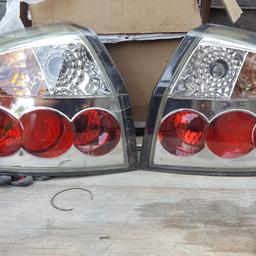 AUDI A4 B6 Lexus style rear lights, in good working condition. ONE of the lights had a crack (see pictures) They are NOT OEM (standard) fiiting and WILL NEED REWIRING (see pictures) I HAVEN'T GOT WIRING INSTRUCTIONS Bought to fir them on my car but can't be bothered with the wiring.