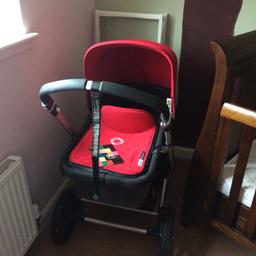 Red/charcoal. Excellent condition. Please note pram frame and wheels not included