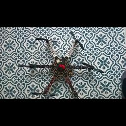Large Drone 60cm wide. Bought 3-4 years ago for £550. Flown a few times only. Still working. Do not have box anymore so unsure of official specs. You can ask questions and we will try to answer as best as possible.