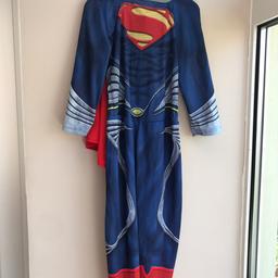 This is a super man dressing up outfit all in one. Age 3-4
