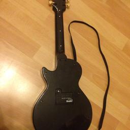 Verkaufe hier eine gebrauchte Elektro Kinder Gitarre von Firma Simba , Gitarre funktioniert einwandfrei 10€ VB. 

Keine Garantie und kein Rückgaberecht.