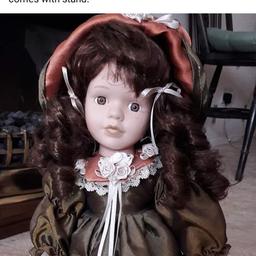Very good condition doll comes with stand