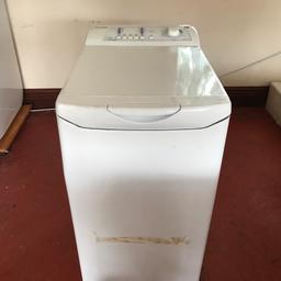 Top loading washing machine, is new never been used but has been in storage so has a couple of marks that can be seen on image and dent in the back.