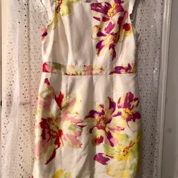 Really pretty floral pattern, feature sleeves, keyhole detail at back of dress.  Fabric has the look and feel of raw silk.  A really gorgeous dress.  Will accept PayPal payments and will post out if buyer covers cost..