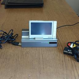 Record or down load video or audio files . Sd card slot , wifi enabled., touch screen, VGC . COMPLETE with rca and scart leads, mini usb lead. ,docking station , and psu.