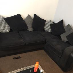 Black corner sofa, zip on two seat cushions are broke but easily fixed. £80 ono
