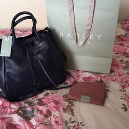 Ladies BNWT 'Radley London' Navy Blue  Bag.

Excellent condition never used,comes with a dust bag and original packing. 

Brought for £199 selling for £120 Ono.