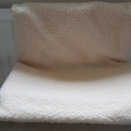 Cat bed that hangs from radiator, warm fleece covering.
Folds flat for storage