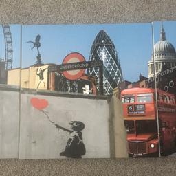 selling 3 banksy canvases which go into one picture. 
Large canvas 
Have been used but no damage. 

Any questions, let me know.