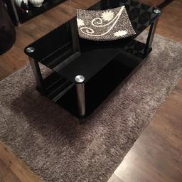 Black glass coffee table
Silver legs
In good condition no marks 
£15
