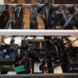 Brand new mining rig, built and tested for a few days. Has been tested and running stable at 150mhs for ethereum.
Can be used to mine many other currencies.

5 x Nvidia GTX 1070 8gb Graphic cards - Best for efficiency and hashing power
More than capable 1000 watt EVGA Gold standard modular power supply with ECO mode
HyperX Fury 4gb RAM.
60gb Corsair SSD (Ultra high speed SATA 3)
Gigabyte Intel H110-D3A Socket 1151 ATX Mining Motherboard
5 x PCI express powered USB risers