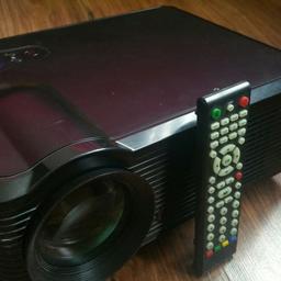 Amazing indie company made projector, i have had it for a for a year is still working like brand new. Can be blown upto 120inches which literally took up my entire wall and the bright LED projection makes gaming so much mind blowing as ever.
Comes with a remote control and power lead.
HDMI Port
USB Port
Tv ariel connection
Svideo
And other in-out connections im not familiar with :/
I also have a twin speaker with sub and can be connected easily for extra £60!!!
No need for expensive Tvs!