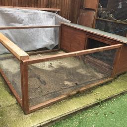 Hutch with attached run.

Hutch measures 6ft x 2 ft x 2ft
Attached run is 6ft x 6ft x 2ft
The hutch has a liftable roof for easy cleaning and so does the run.
Can also come with 3 little houses which can be seen in the run part in the photos and a tunnel.

Hutch has some chew marks on the inside.