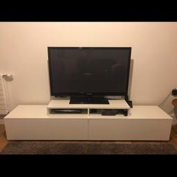 White Media Unit, front doors are white gloss. Very good condition. Length is 200 cm
Has lots of storage (pls excuse the untidiness) and doors are soft closing.