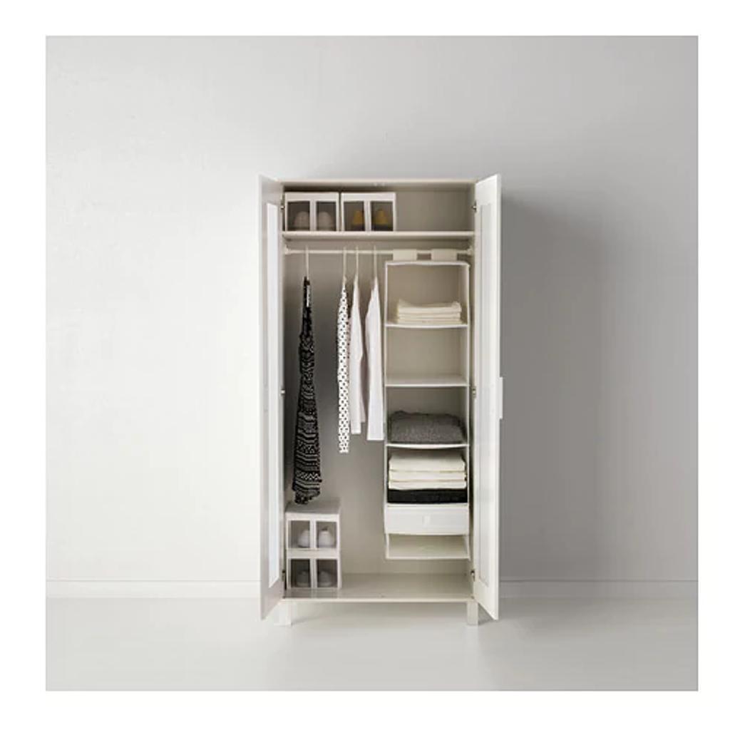 Cupboard storage with 6 compartments. The hook and loop fastener makes it easy to hang up and move. I have 1 in black and 1 in white. Each for £7 or both for £12.