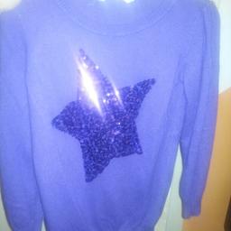 Verkaufe einen Lila Pullover mit Stern drauf. Von H&M.