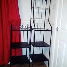 Ikea shelving unit. Black metal and glass removable shelves for easy cleaning.