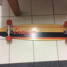 Longboard made by Two bare feet
Excellent condition due to little use 
Measures 116 cms long
Metal trucks
Call 07917548793