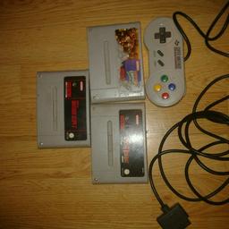 Collectable Super Nintendo control and games; Mortal combat 2, Nintendo Scope and Donkey Kong.