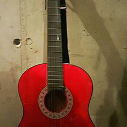 Gitarre rot, auf Wunsch mit Gitarrenständer, eine Saite defekt, Gitarre  € 15.00, Ständer  € 8.00.