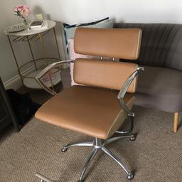 Unused salon chair in tan colour with foot stool mint condition. Thanks