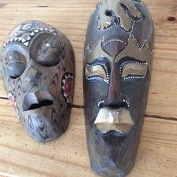 Two very nice African face masks one is 9 inches high the other is 13 inches