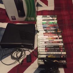 360 slim 250 gig boxed all original leads 25 games including GTA V also all guitar heroes as well as drum kit and guitar, spare battery pack and plug and charge lead