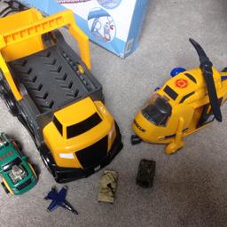 Transporter truck mega blocks
Helicopter with lights and sounds, moving propeller and winch
Some extra small bits thrown in
Smoke and pet free home 
Please see my other items for sale