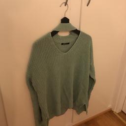 Stickad tröja med inbyggd chocker från Gina storlek xs i mint grön
