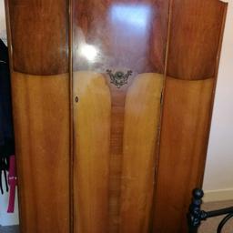 FREE .. Big wardrobe which has been taken apart (just fixes together in the middle)so we could get it down stairs .. needs a couple of panel pins on the right hand side but is a very sturdy piece of vintage furniture idea project or great left as is