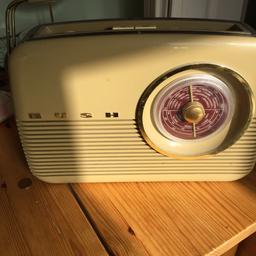 Bush retro radio - works well missing cable to plug it in . Easy to get though to be collected