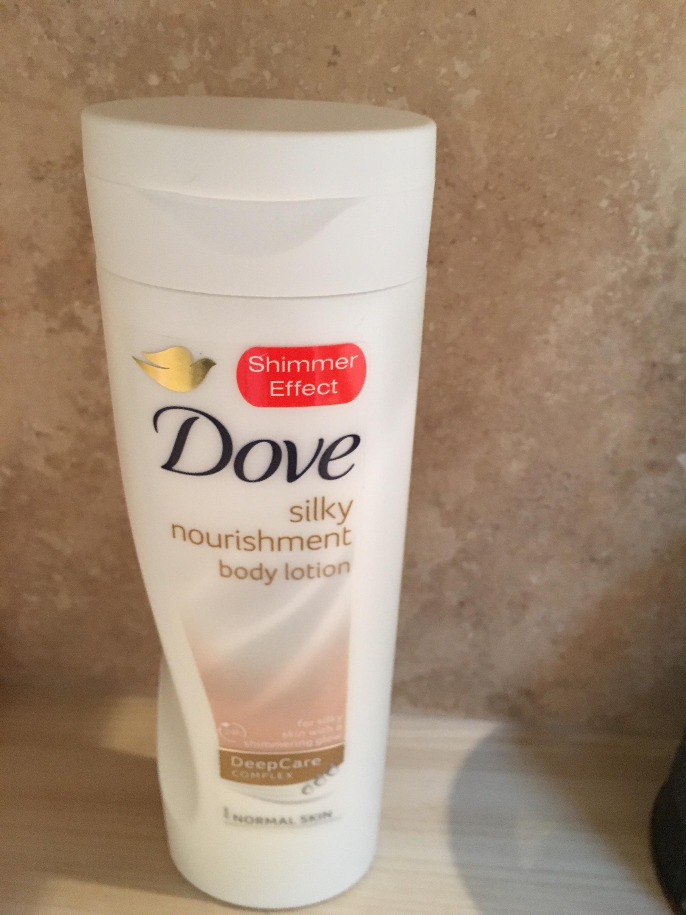 Dove shimmer effect body lotion in MK41 Brickhill für 0,50 £ zum