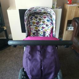 purple pushchair with cosey toes and liner and pram top with new matress and sheet.