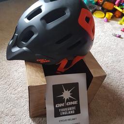 Mountain bike helmet still in box. Black and Orange

Didnt fit me so selling
