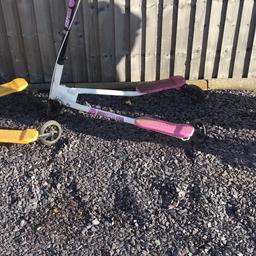 White and pink tri scooter. No longer used.