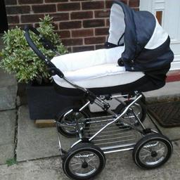 Pram, used for the grand kids, clean , used condition . Footrest stuck in upright position on the toddler carriage section , but haven't found this to be a problem ..35 ono.