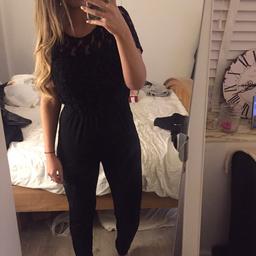 Worn once a Lacey/sparkle jumpsuit from topshop worn twice perfect for a Christmas do! Size 12