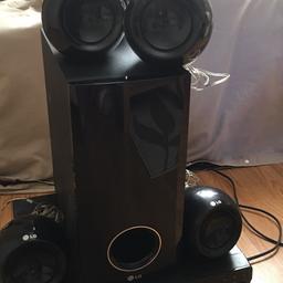 DVD with surrounded sound and 5 speakers, controls 
Buyer must collect